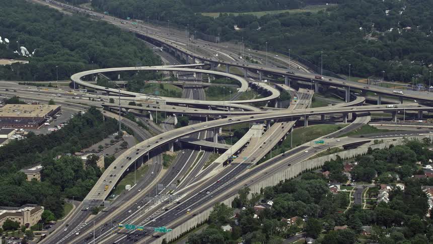 Aerial view of traffic approaching the I-495 and 395 freeway interchange in Springfield Virginia on a sunny day