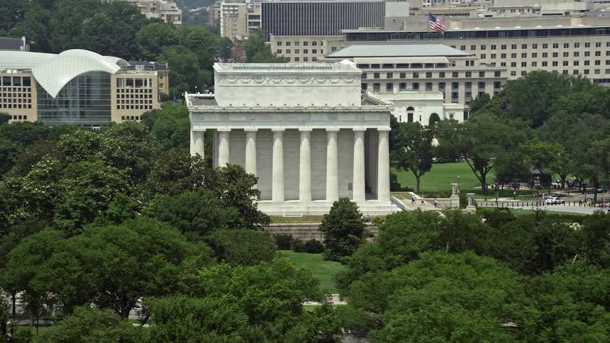 A stunning aerial view of the iconic Lincoln Memorial on the south side amidst the sunshine and blue sky in Washington DC