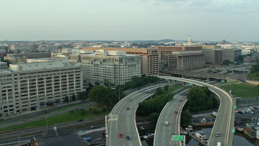 An aerial view at dusk of government and Federal Communications Commission office buildings in Washington DC during sunset