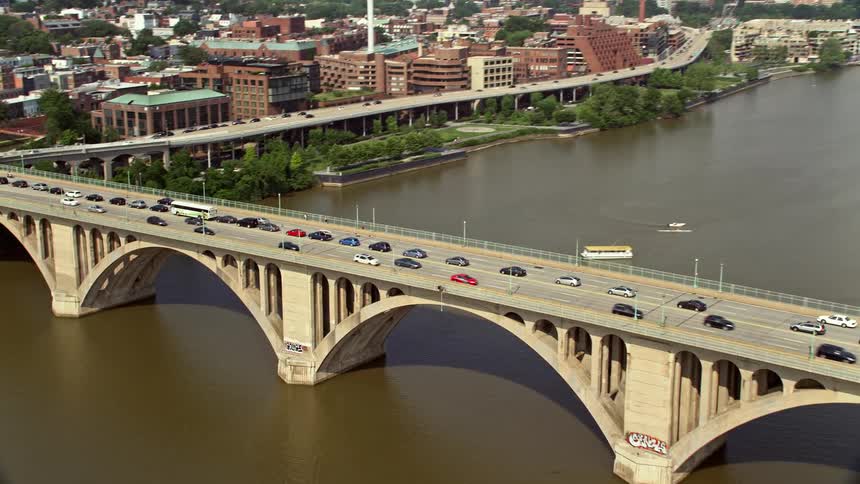 Heavy traffic on the Francis Scott Key Bridge in Washington DC during sunny daytime