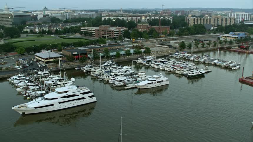Yachts docked at Gangplank Marina in Washington DC during twilight