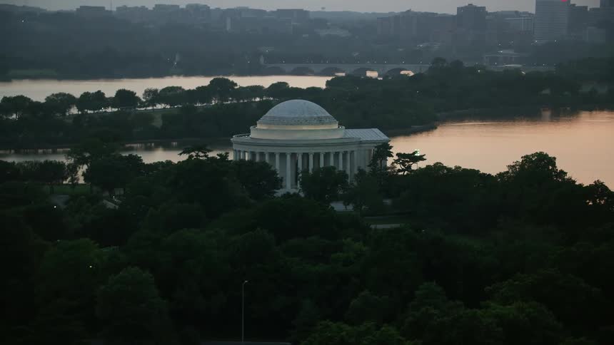 Twilight aerial footage of the iconic Jefferson Memorial next to Tidal Basin during summer in Washington DC