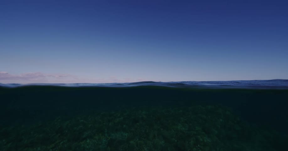 Ocean waves rippling at sunrise