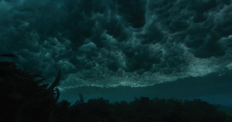 A large wave moves over the ocean floor
