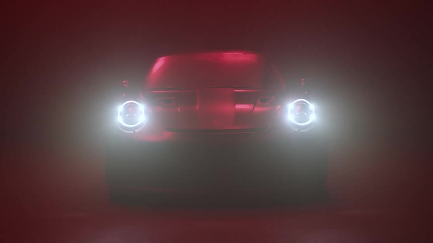A vehicles headlights and high beams turn on