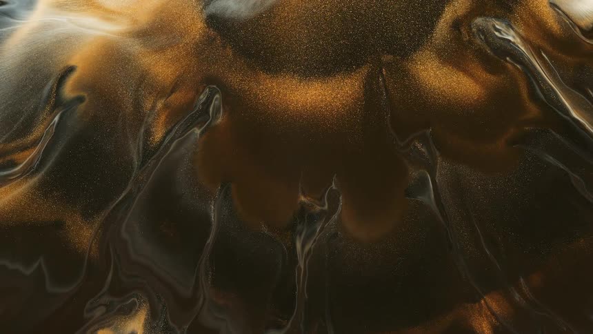 Abstract brown liquid with golden sand flowing