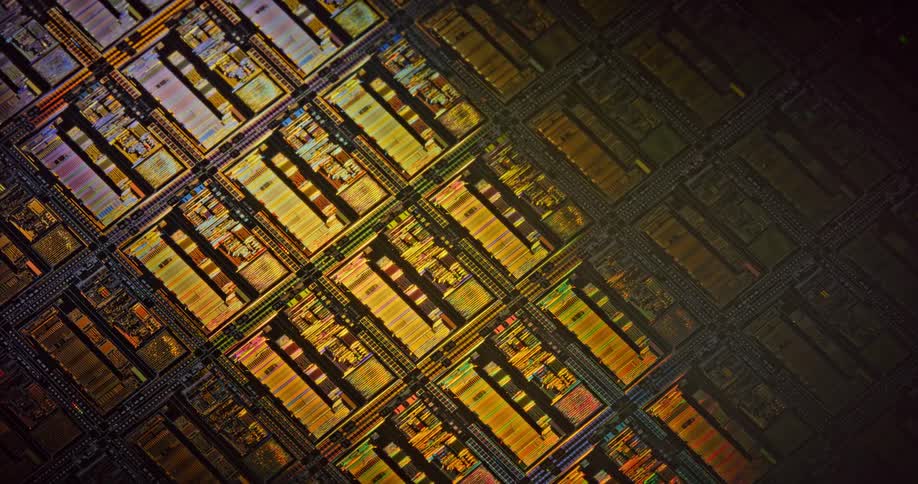 A light passes over sections of a gridded circuit board
