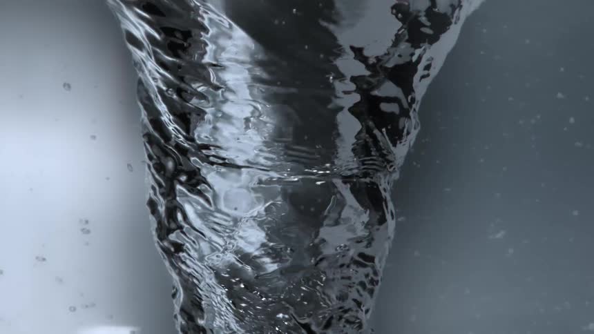 Underwater waterspout columnar vortex on clear water