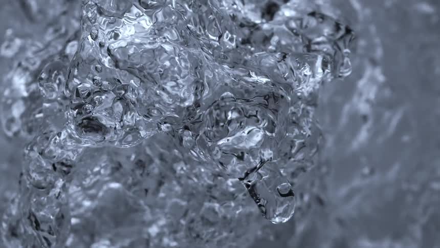 The water pours and bubbles like a fluid sculpture