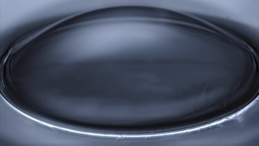 The bubble pops as it rises in perfect symmetry