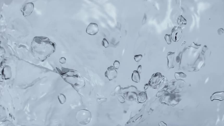 The bubbles rise and pop underwater