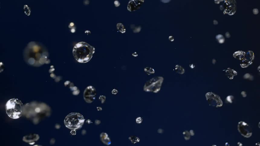 Many diamonds are seen shooting across the scene on blue background