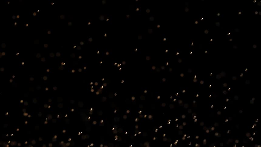 Abstract footage of bubbles moving up and down in liquid