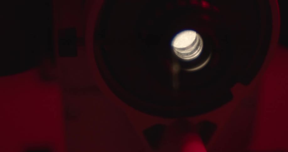A person turns a lamp on and off
