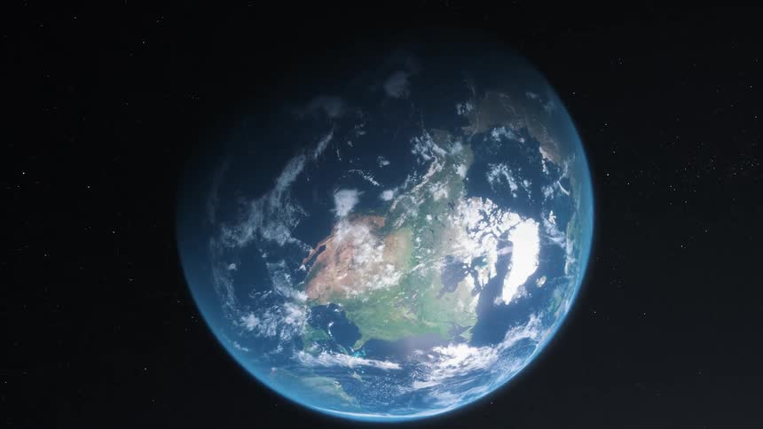 The northern hemisphere of earth is partially obscured in the night sky
