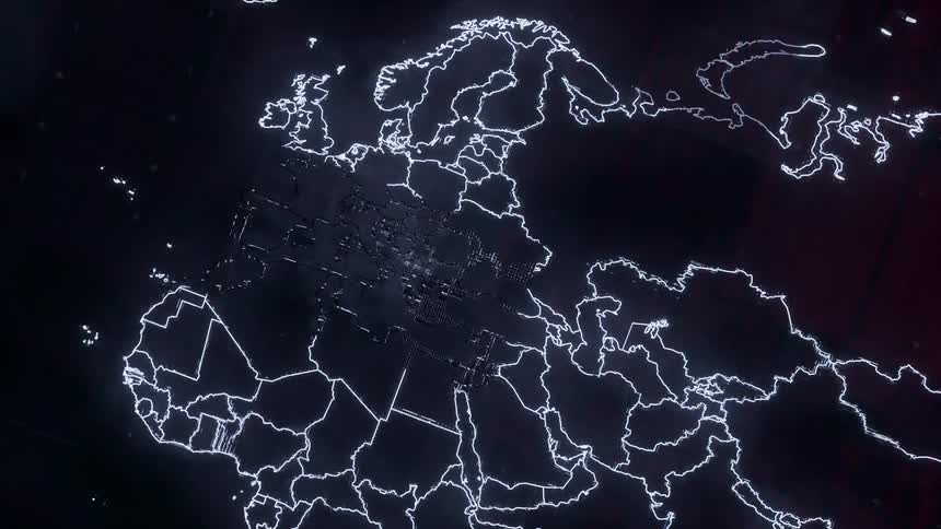A digital data map is glowing white on a black surface as it flashes and electronic components show through the image