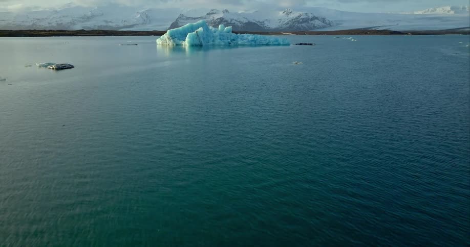 Aerial view of iceberg floats in the sea