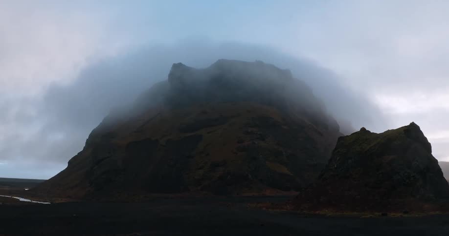 A long shot of a big rock