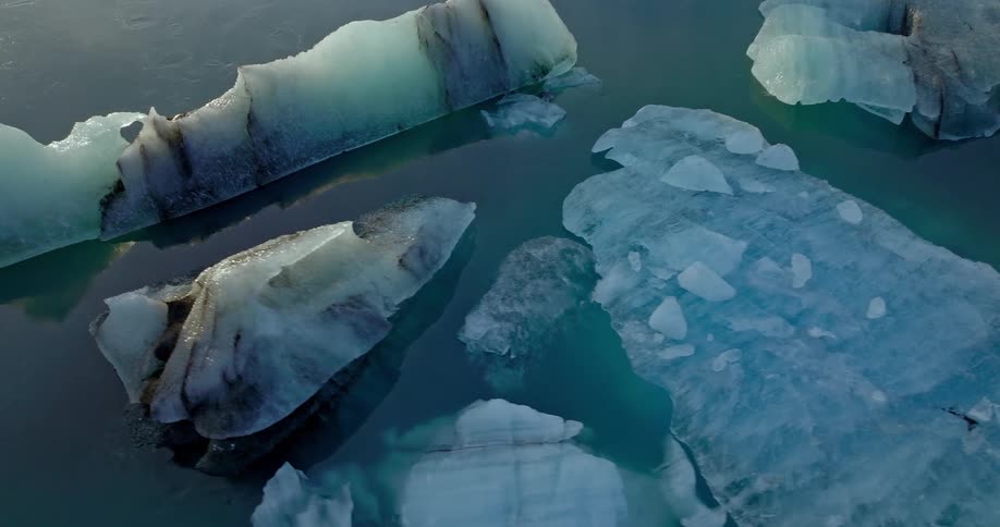 Aerial view of ice fragments floating on water
