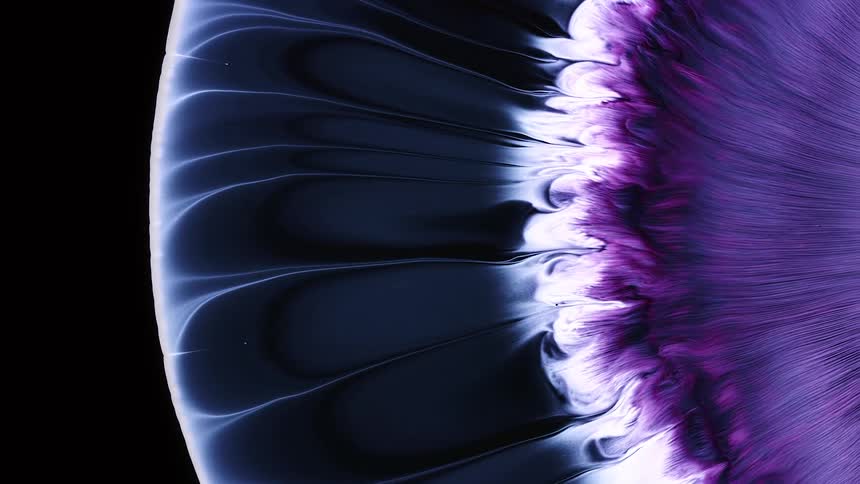 Black white blue and purple colors expanding like a bubble