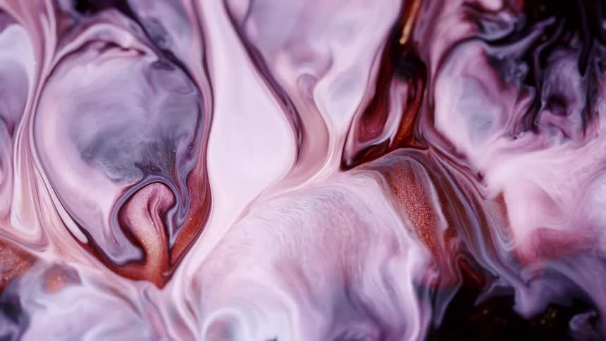 Opalescent paint oozes and mixes together