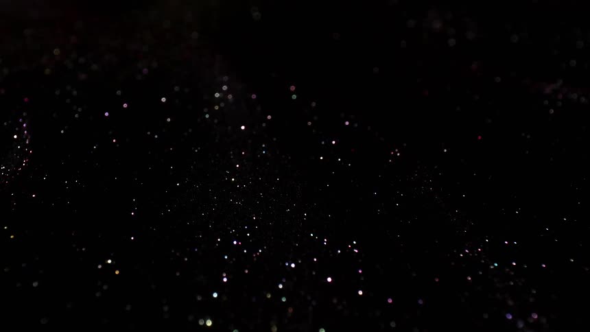 Glittering light in a sea of black