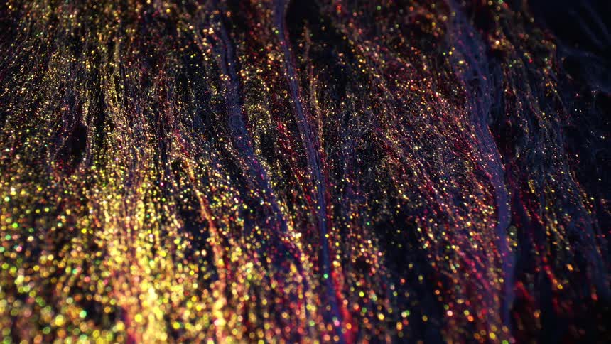 An abstract footage of a golden liquid flowing