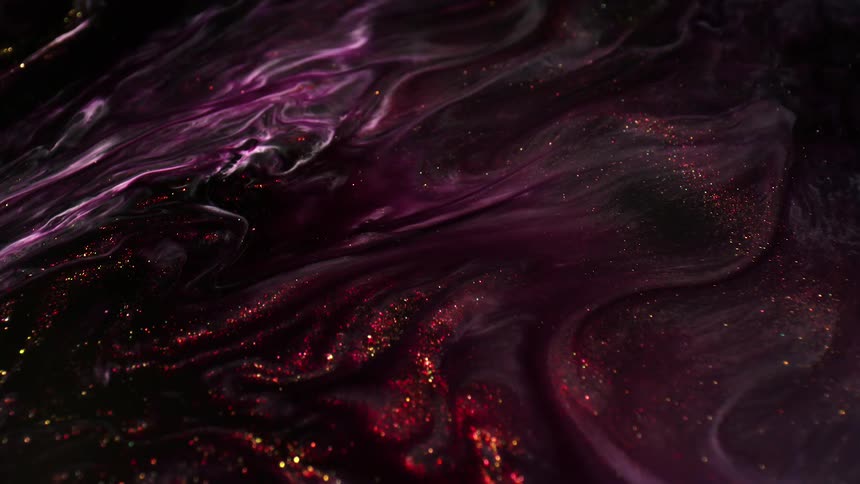 Purple liquid swirls flows and glitters