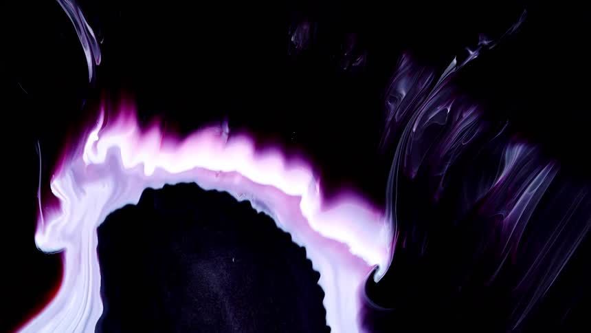 A dark shiny fluid flows past with streak of pink and white interspersed within it