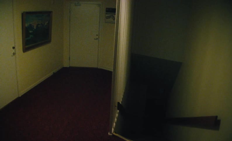 The hallway and staircase are empty