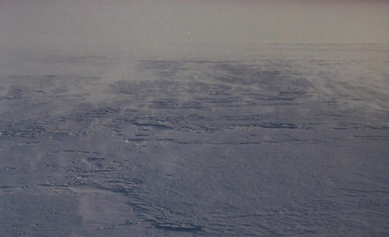 A view of snow blowing in the arcitc