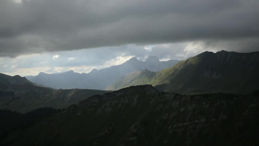 A cloudy mountain top sky