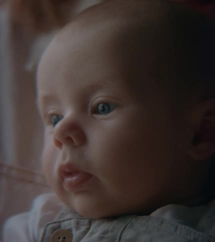A young baby with blue eyes