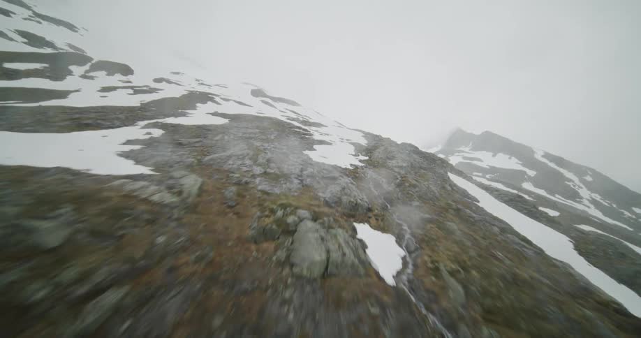 Foward shot of a mountain covered in snow