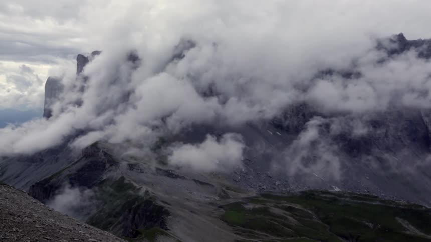Clouds are obscuring this mountain top