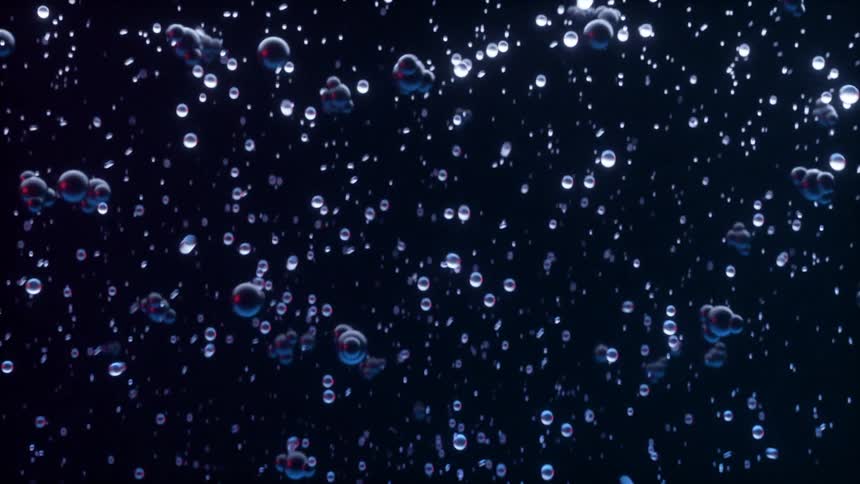 Underwater molecules and bubbles are floating and shifting