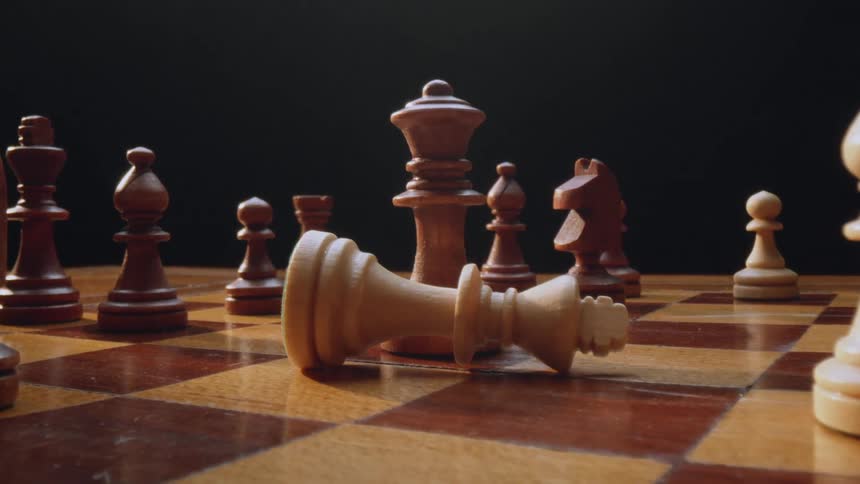 Close up of chessboard with pawn castle knight bishop queen and king