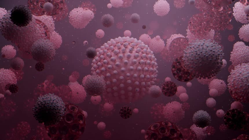 A virus floats among a sea of microbial cells underwater
