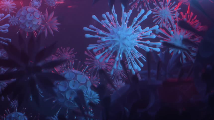 Close up of a white virus floating in a sea of other strange microbes