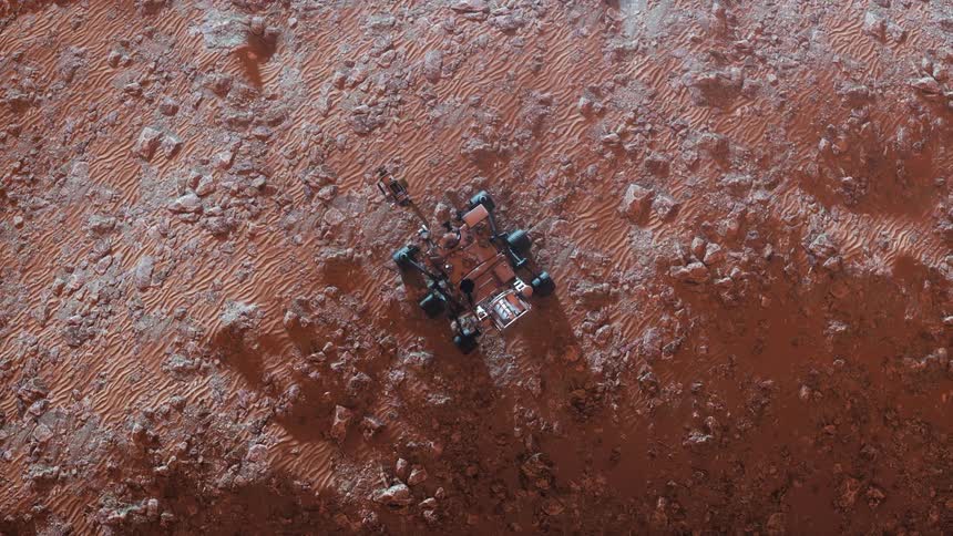 An aerial of Perseverance Rover on Mars overlooking a Martian valley