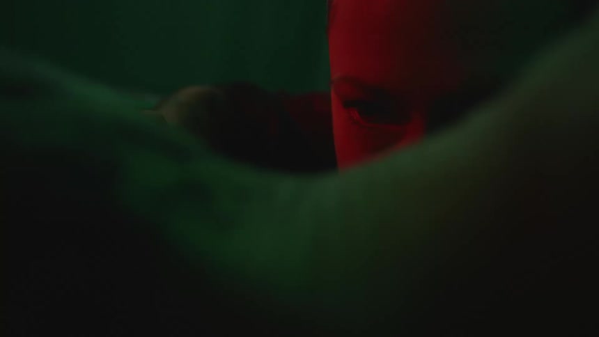 Close up view of a womans face is displayed