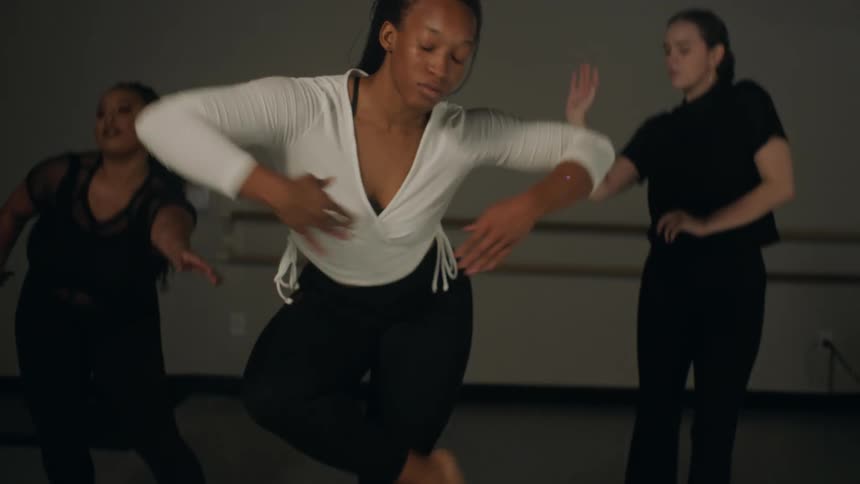 Women are dancing together