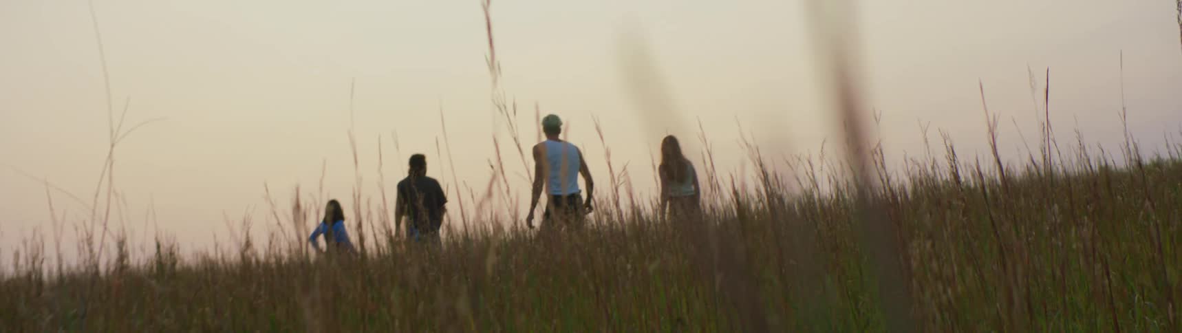 The view is of friends hanging out around the nature area
