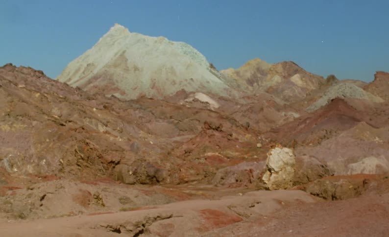 The view is of the desert area around summer time