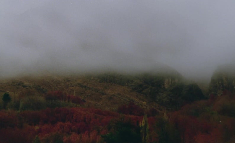 Mountains in fog seen from town