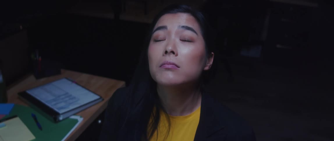 A young asian woman is working in the office