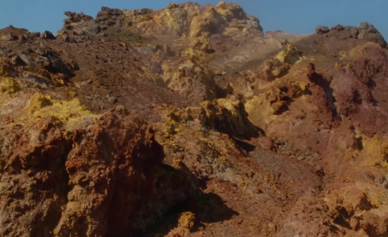 A view of a mountainous landscape is displayed