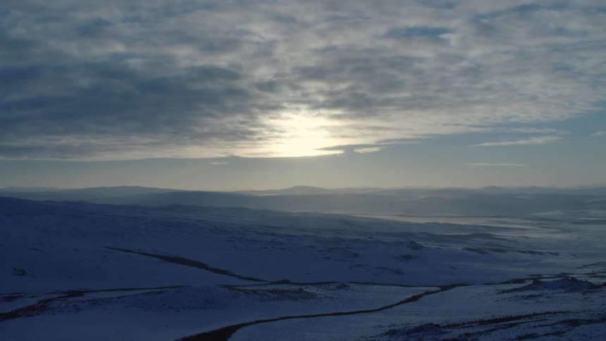 The view is of the nature area in the winter time