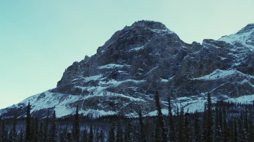 A view of a mountain covered in snow