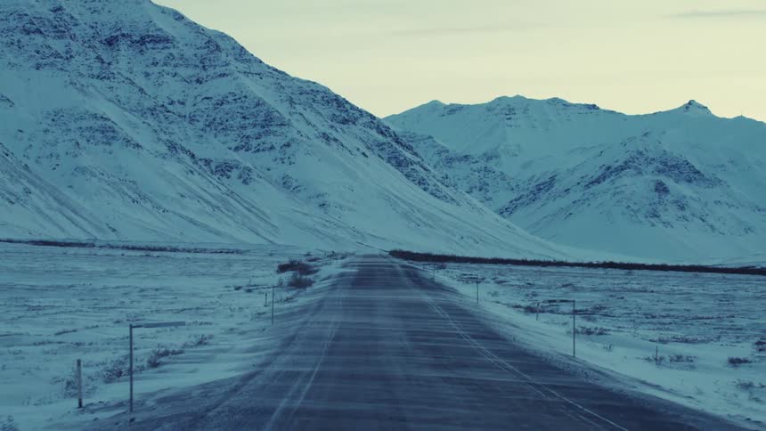 A view of a road in the winter
